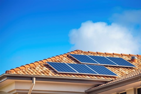 A solar panel on a roof.