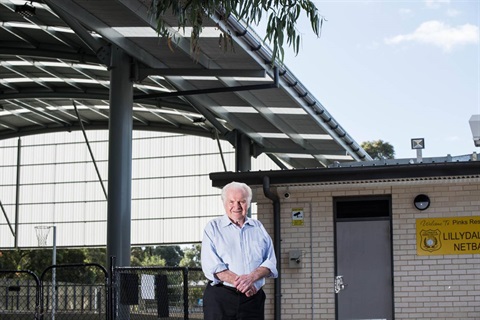 Cr Len Cox in front of netball facilities in Pinks Reserve