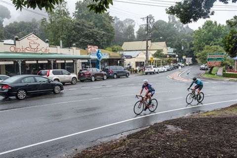 Cyclists travelling through Olinda Main Street