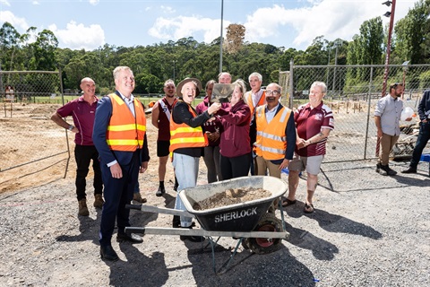 Tony Smith MP, Johanna Skelton, James Merlino and representatives from Mt Evelyn sport clubs turn the sod at the MESCH site.