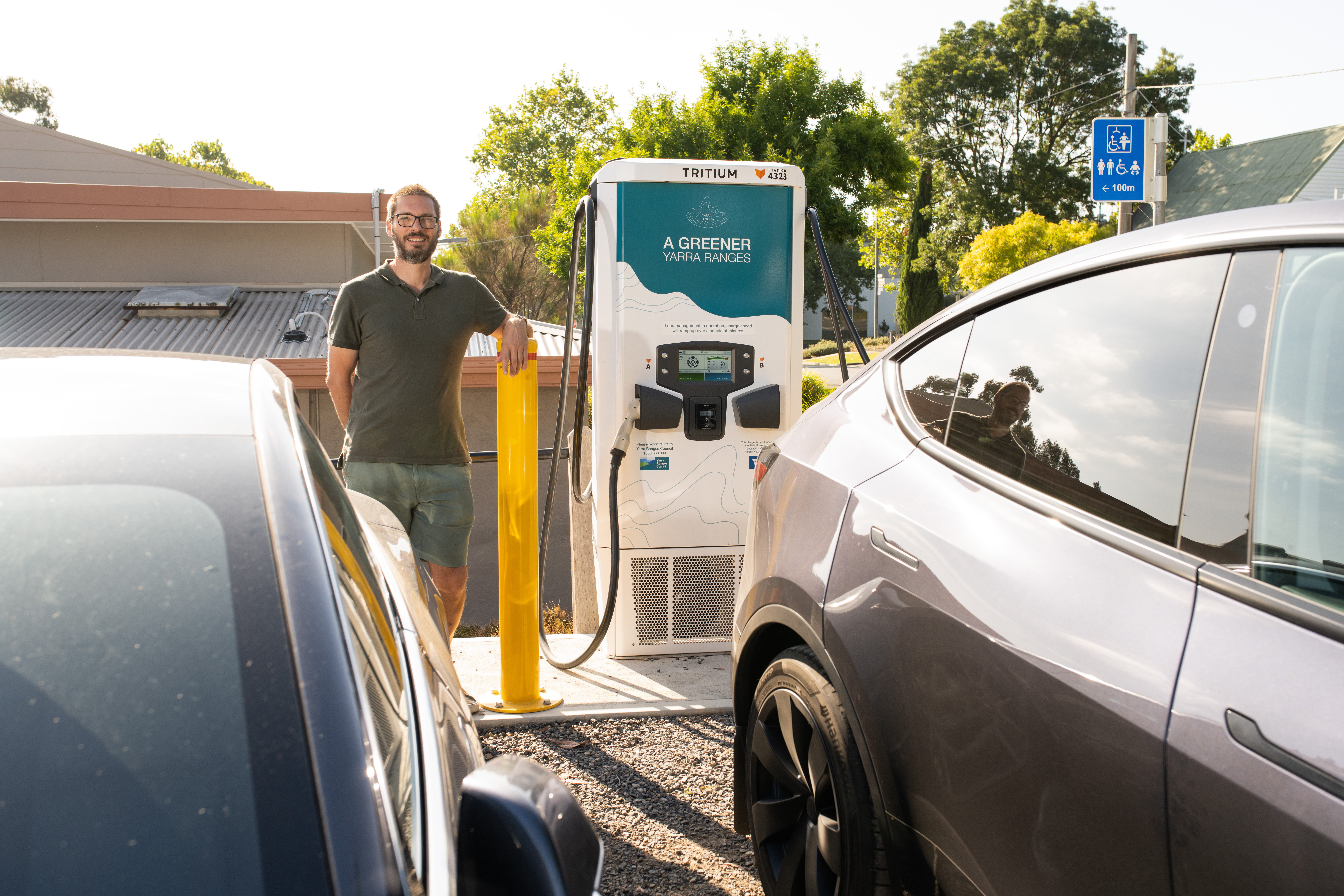 Trent Evans charges his car at the Yarra Glen EV Charger
