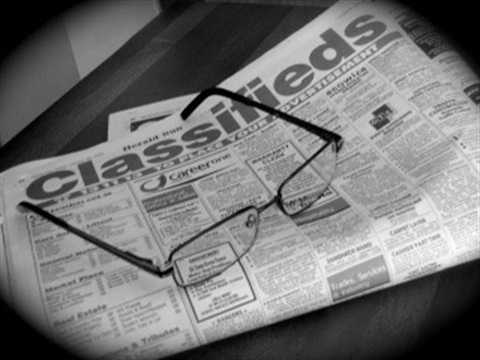 newspaper and glasses