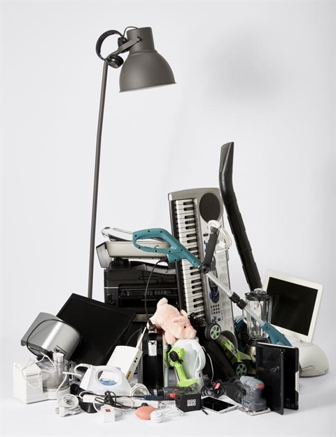 A collection of appliances in a pile. Anything that can use power is classified as e-waste when it's ready to be thrown out.