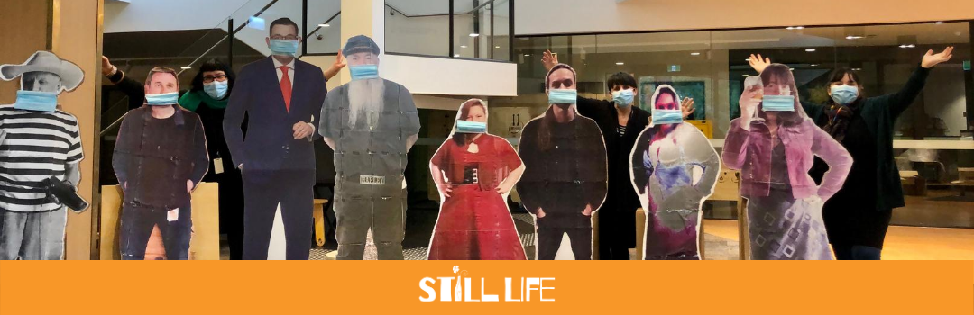 Staff at Burrinja Cultural Centre put masks on cardboard cutouts