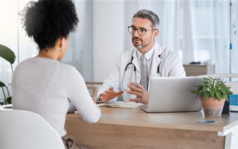 Person talking to a Doctor