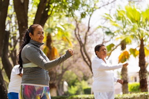 Group of ladies doing a dance activity in the park