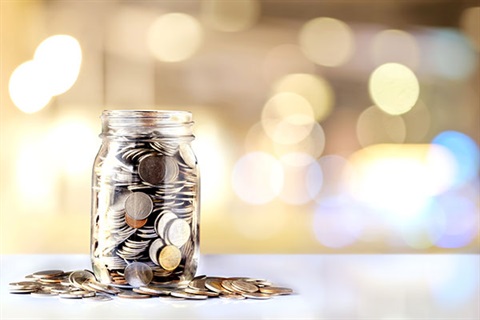 picture of a jar full of coins