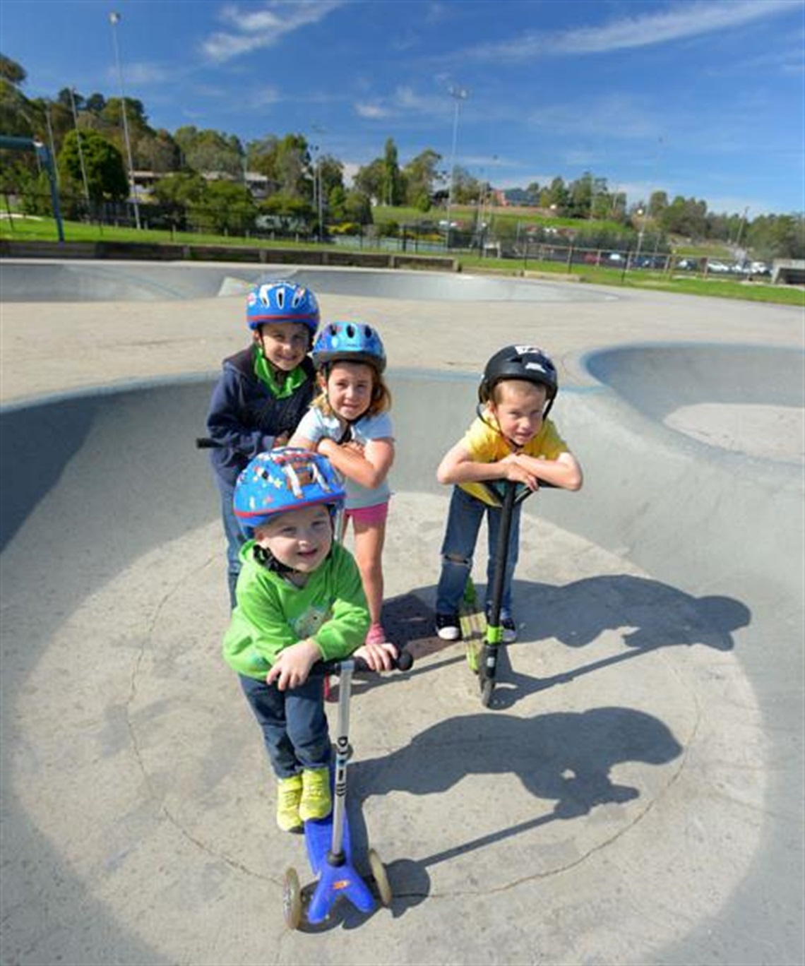 Kids riding their scooters at Lilydale Skate Bowl