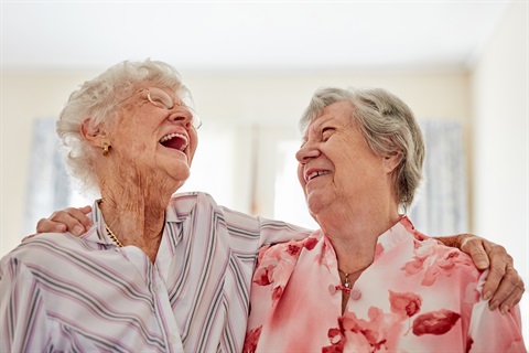 elderly ladies laughing together