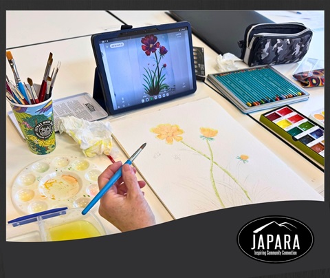 person drawing and painting